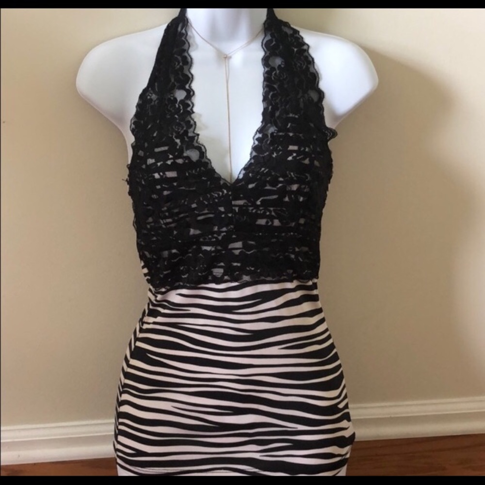Halter top, medium zebra print. Smoke free home.